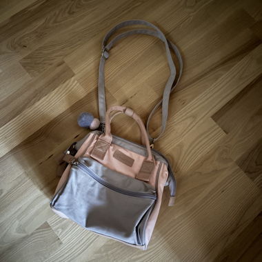 Pastel pink handbag with shoulder strap
