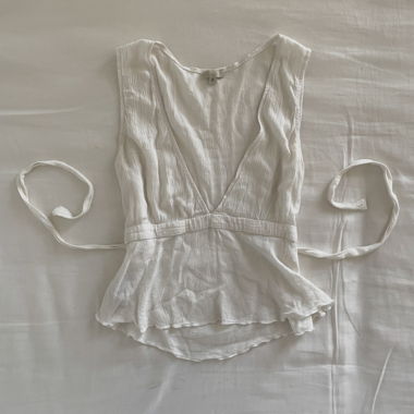 White tie-back sleeveless top