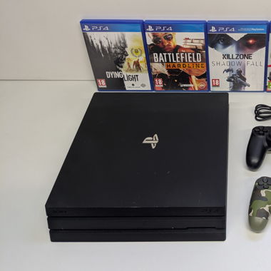 Sony PlayStation 4 Pro, 2 Controller, 5 Games