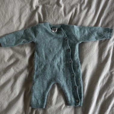 Turquoise baby knitted romper
