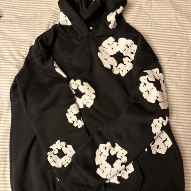 Denim tear hoodie with white floral print