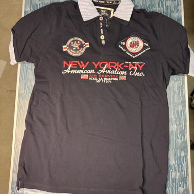 Navy polo shirt with aviation print