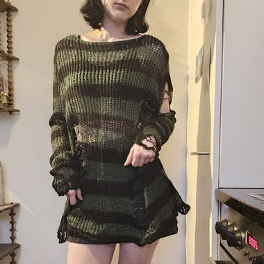 Distressed knit sweater