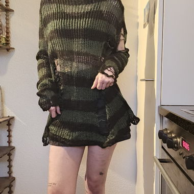 Distressed knit sweater