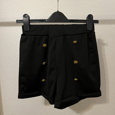 Short noir élégant, taille S, parfait pour l'été