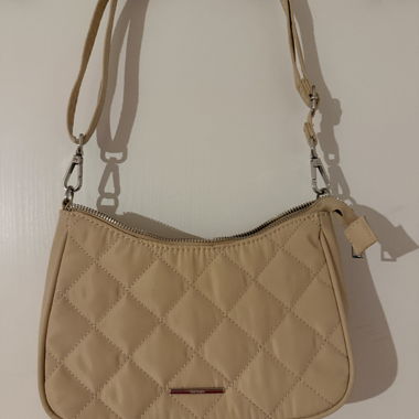 Beige quilted crossbody bag