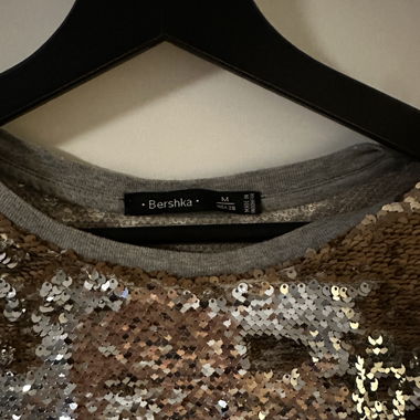 Abito oversize con paillettes