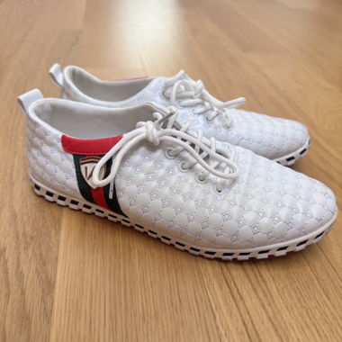 White lace-up sneakers