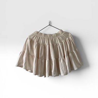 Jupe beige à volants