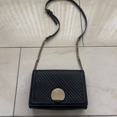 Black shoulder bag with chain strap