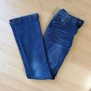 Pantaloni a zampa vita bassa