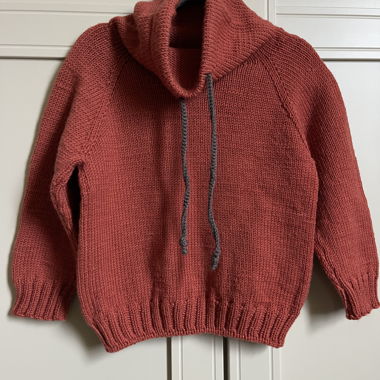 Maglione per bambini lavorato a mano in 100% lana merino