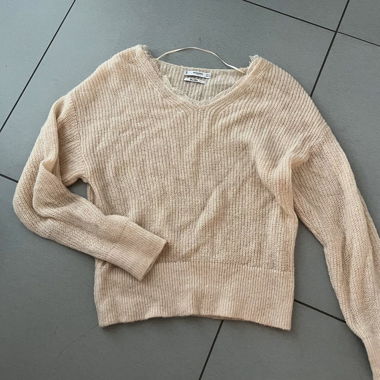 cream v-neck pullover
