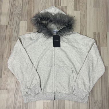 Felpa con zip in pelliccia