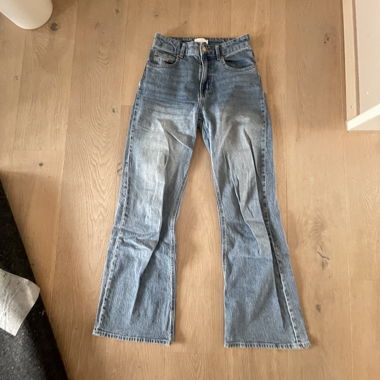 Jeans a zampa azzurro chiaro