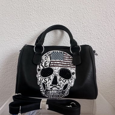 Borsa nera con teschi