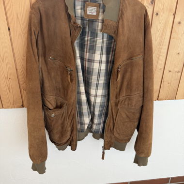 Veste en cuir avec doublure à carreaux