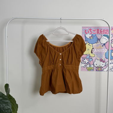 burnt orange peplum top