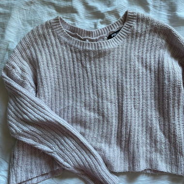 Maglione in maglia con allacciatura sul retro