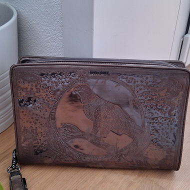 Diesel Clutch mit Vogelmotiv