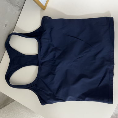Top de sport bleu foncé à dos nageur