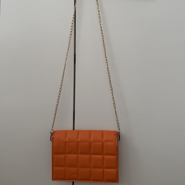 Orange quilted crossbody bag