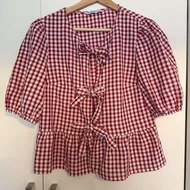 Blusa Stradivarius con fiocchi