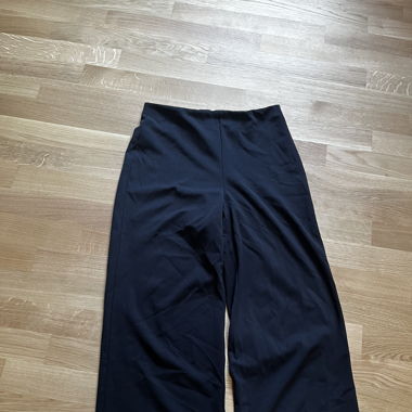 Schwarze flowy Hosen von H&M