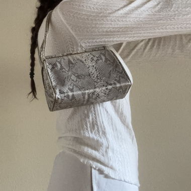 Borsa a tracolla con motivo serpente