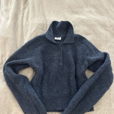 Dark blue knitted sweater