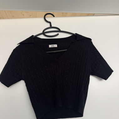 Black short-sleeve top