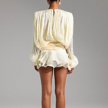 Blusa in seta color crema con nastro da annodare