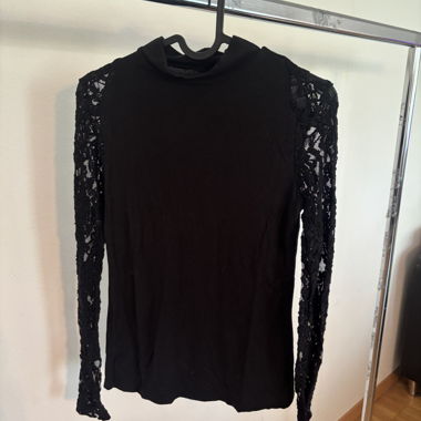 Black top with lace sleeves
