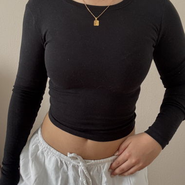 Black long-sleeve top with back