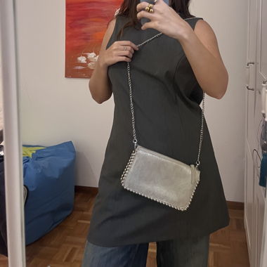 Silver purse with metal details 