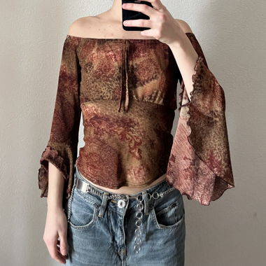 Whimsy top with beautiful patterns 