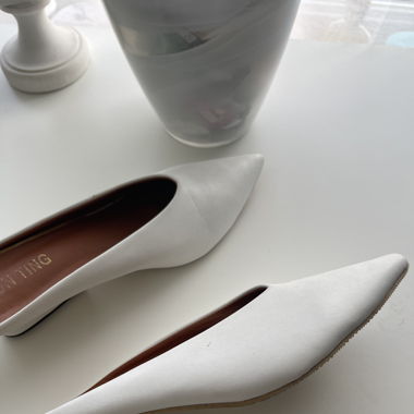 Open back white shoes 