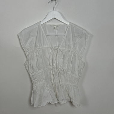 Top bianco senza maniche arricciato