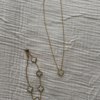 Collana e bracciale con quadrifoglio color oro