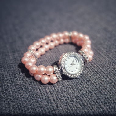 Uhr (ungetragen, fabrikneu) pink / elastisch 