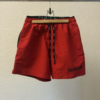 Red swimming shorts