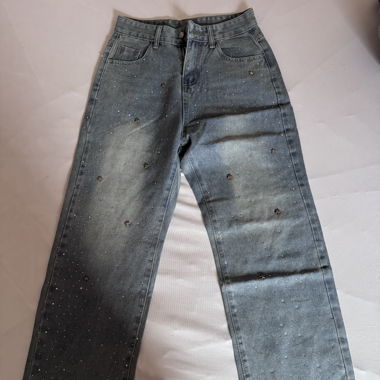 Pantaloni con brillantini e stelline