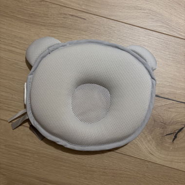 Grey ergonomic baby pillow
