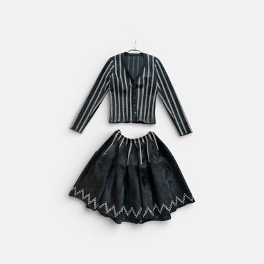 Alaïa Ensemble Rock und Cardigan schwarz Grösse 40