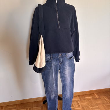 Jeans donna vita alta con patta a bottoni