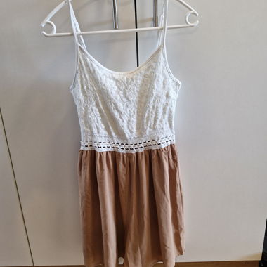 Tuta con pizzo bianco