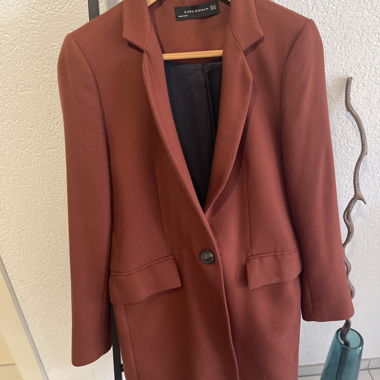 Rust-coloured coat