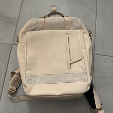 Beige backpack with laptop compartment