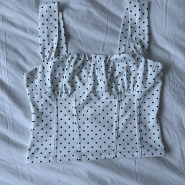 Top corsetto a pois