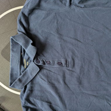 Polo blu a maniche lunghe